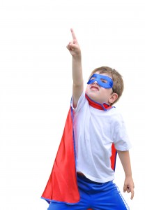 Super Hero Boy Pointing on White Background