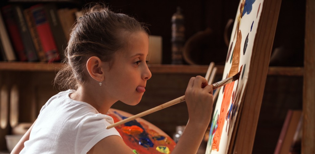 Young talented  girl artist painter