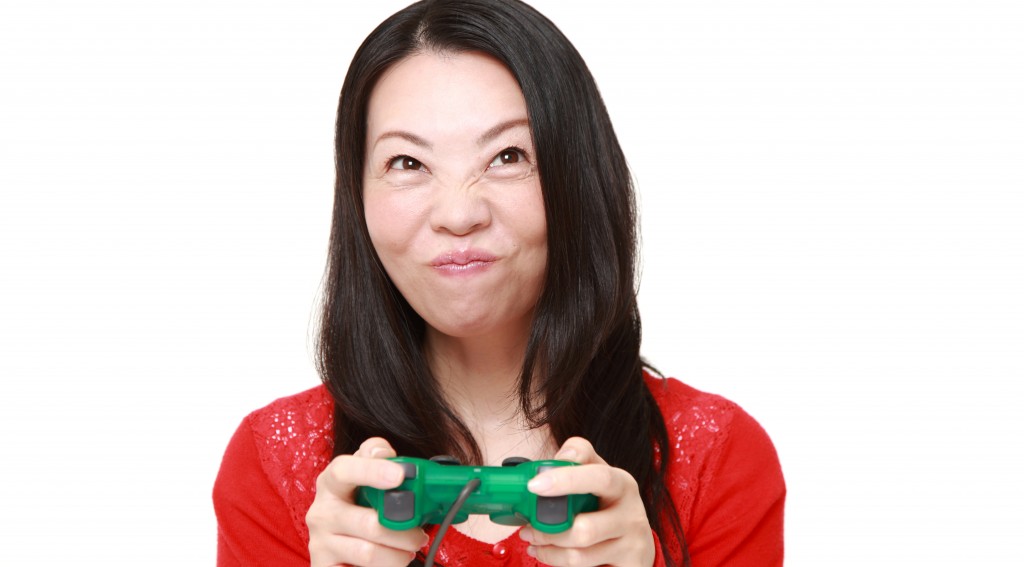 Japanese woman enjoying a video game