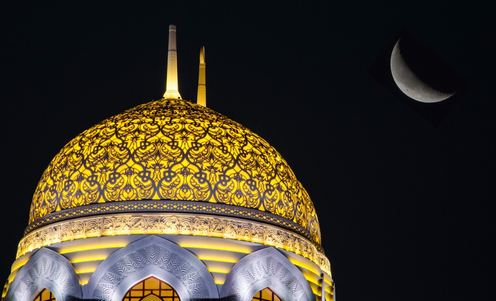 Moon and mosque dome in Oman